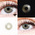 LuxDelux Gin Tonic farbige Kontaktlinsen ohne Sehstärke in einer sanften graubeigen Farbe mit kleinen Punkten